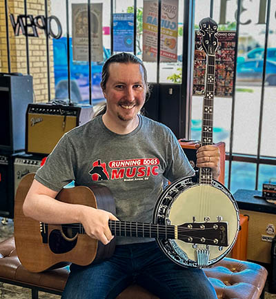 Micah Obal teaches guitar, bass, ukulele and banjo